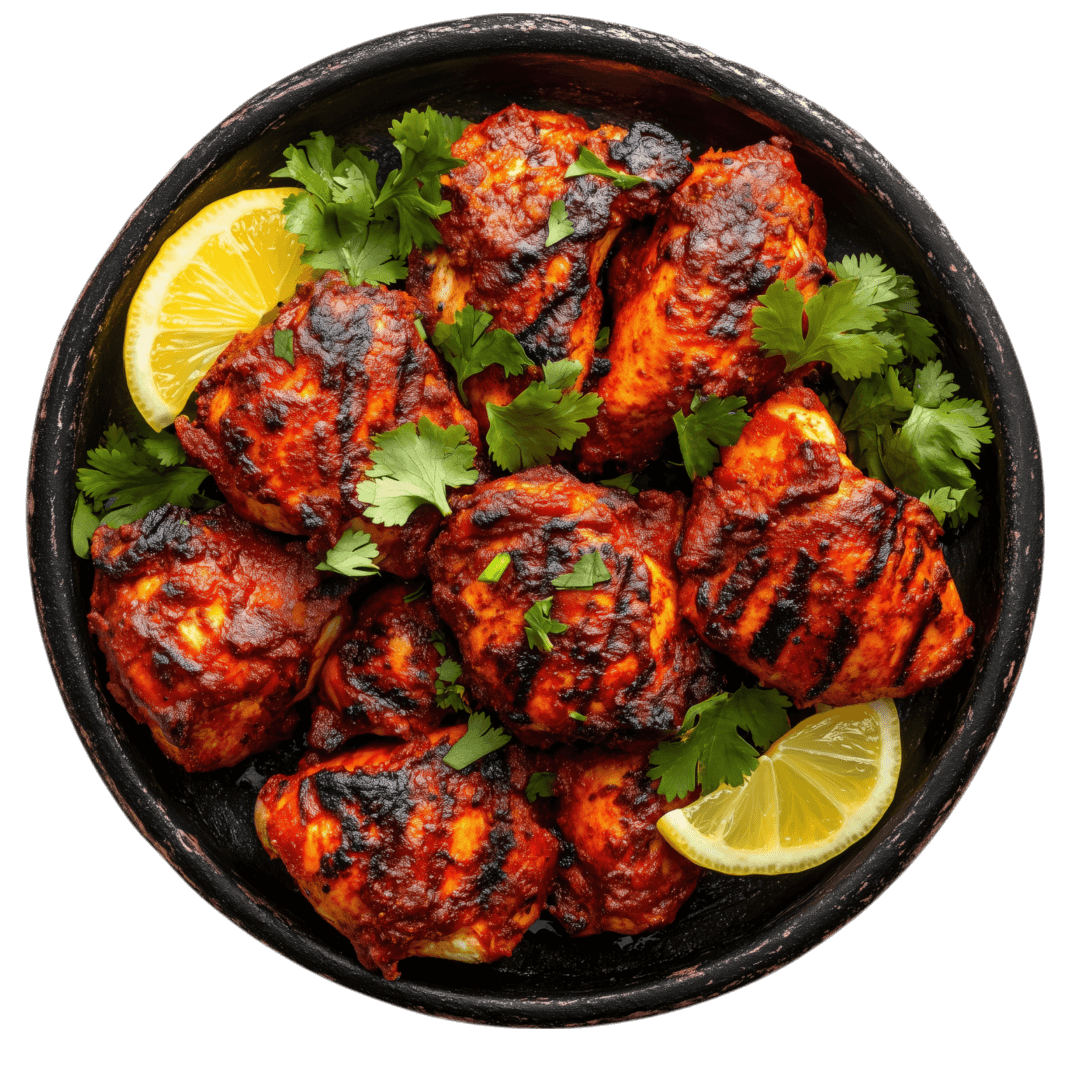 Tandoori special Authentic Chicken Tikka Masala served in a royal copper bowl at Delhi Darbar restaurant